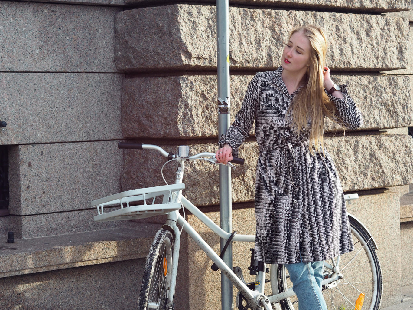 Dress, jeans with bike