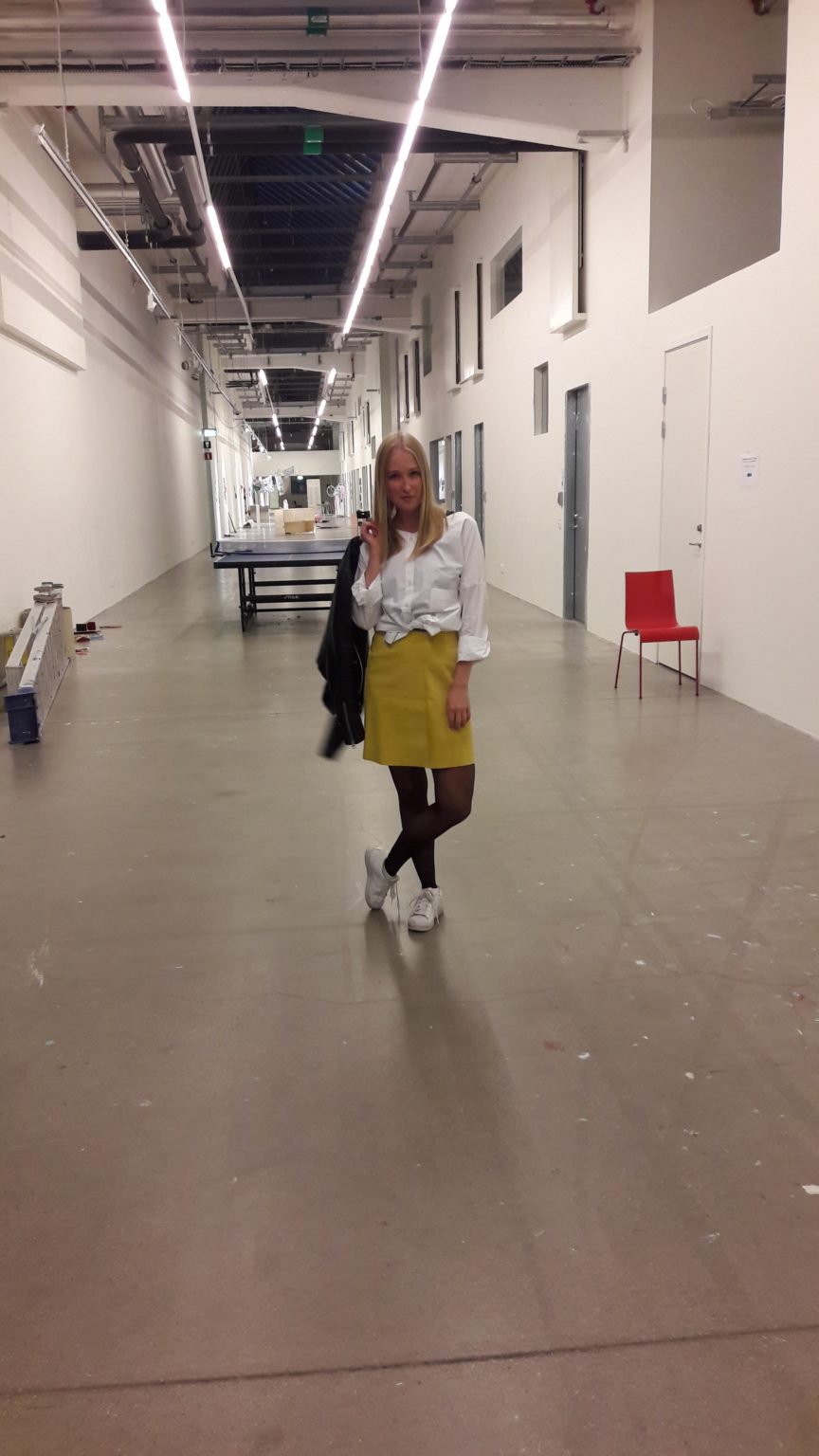 Yellow leather skirt with a white shirt